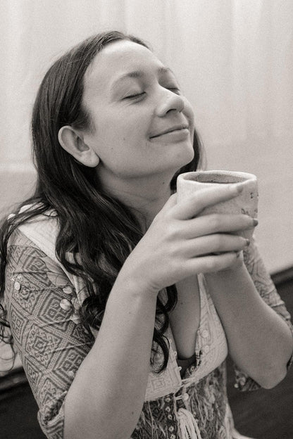women drinking cacao